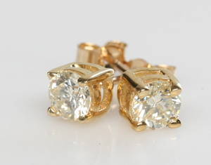 Par brillantørestikker, ca. 0.57 ct. 2