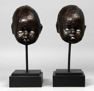 Børnemasker udført i bronze 2