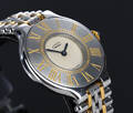 Cartier `Must de Cartier 21´. Dameur i 18 kt. guld og stål prydet med safir, 1990erne