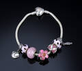 Bacio, Italien. Armbånd med 7 charms, sterlingsølv