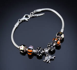 Bacio, Italien. Armbånd med 7 charms, sterlingsølv