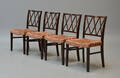 Dansk møbelproducent sæt på fire stole i mahogni