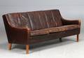 Dansk møbelproducent. Tre-pers. sofa, brunt skind