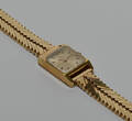 Vintage Omega de Ville damearmbåndsur af 14 kt. guld