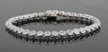 Tennis Bracelet in 18K gold set with brilliant-cut Diamonds approx. 5.74ct