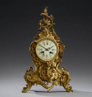 Fransk kaminur af bronze i rokokostil, 1800-tallets slutning Denne vare er sat til omsalg under nyt varenummer 4456740