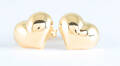 Earrings in a heart motive in 14k yellow gold