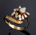 Brillantring af 18 kt. guld, i alt ca. 0.75 ct 