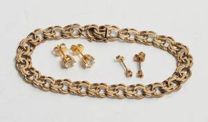 Bismarck armlænke samt ørestikker af 8 kt. guld