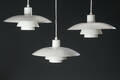 Poul Henningsen for Louis Poulsen, tre PH4 pendler.