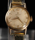 Omega. Vintage armbåndsur af 14 kt. guld