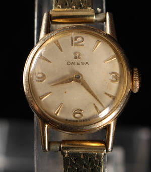 Omega. Vintage armbåndsur af 14 kt. guld