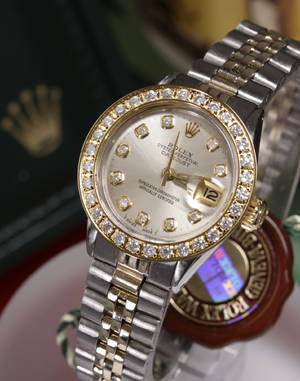 Rolex Oyster Perpetual Lady Datejust med diamantskive og safirlynette,  ca. 0.12 og 1.10 ct.  Denne auktion er annulleret - se nu vare 1949105