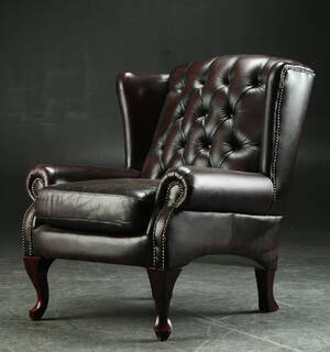Øreklapstol i Chesterfield form, læder