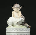 Royal Copenhagen. Figur af porcelæn. Faun med kanin nr. 439