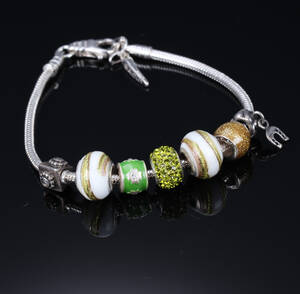 Bacio, Italien. Armbånd med 7 charms, sterlingsølv