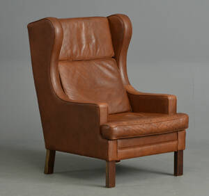Øreklapstol med brunt læder