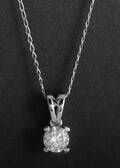 Pendant in 14k set with a brilliant cut diamond 0.43 ct