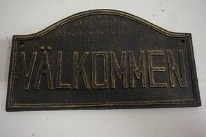 Välkommenskylt i gjutjärn