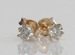 Par brillantørestikker, ca. 0.40 ct. 2