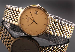 Omega De Ville. Herreur i forgyldt stål med champagnefarvet skive, ca. 1991