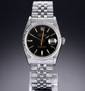 Rolex Datejust. Herreur i stål med sort skive med dato, ca. 1984