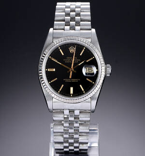 Rolex Datejust. Herreur i stål med sort skive med dato, ca. 1984