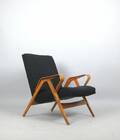 Lounge Sessel der 1950er Jahre mit Armlehnen in Schichtholz Diese Ware steht erneut zur Auktion unter der Warennummer 4051008