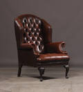 Wingchair, brunt skind