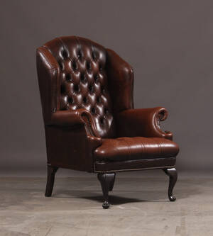 Wingchair, brunt skind