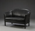 Mogens Hansen. To-personers sofa af patineret sort læder