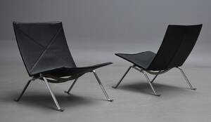 Poul Kjærholm. Et par PK-22 Lounge lænestole, sort læder 2 