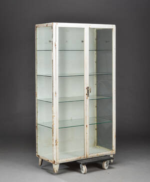 Tandlægeskab af hvidlakeret metal og glas