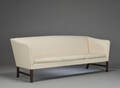 Ole Wanscher. Tre-pers sofa med stel af mahogny, betrukket med lyst stof.