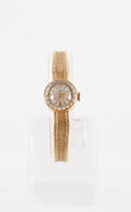 Tissot, Damarmbandsur i 18K guld 