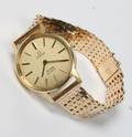 Omega De Ville. Damearmbåndsur. 14 kt guld