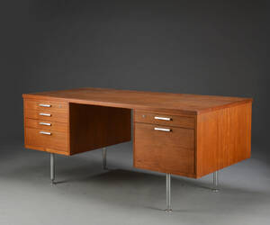 Møbelproducent. Fritstående skrivebord af teaktræ