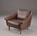 Møbelproducent. Lænestol, brun læder