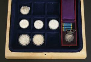 Silvermynt och medalj, 7 delar