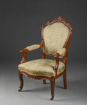 Nyrococo armstol af nøddetræ. 1800-tallets midte