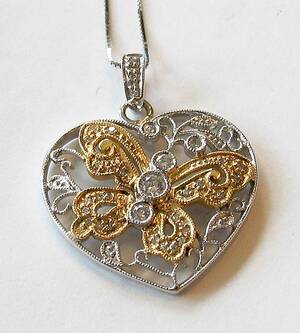 Hvidguldshjerte m diamanter samt halskæde 2