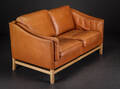 Stouby. 2½-pers. sofa betrukket med cognacfarvet læder