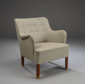 Lænestol overpolstret med knapsyet uld