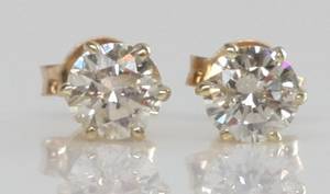 Par brillantørestikker, ca. 0.96 ct. 2