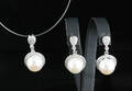 Fresh water pearl and cubic zirconium earrings and pendant 