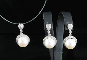 Fresh water pearl and cubic zirconium earrings and pendant 