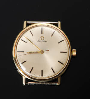 Vintage Omega, herrearmbåndsur i 14 karat guld