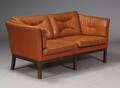 Ryesberg Møbler. To-pers sofa, cognacfarvet skind