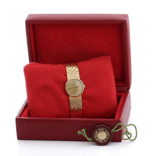 Rolex Genève. Dameur i 18 kt. delvist satineret guld