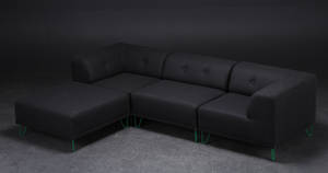 Nomad DOT modulsofa, betrukket med antrazitgråt filtuldstof, grønne metalben  